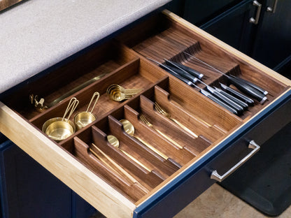 Handmade walnut kitchen drawer organizer tailored to you, with neatly arranged utensils, flatware, and gadgets, crafted in Arizona.